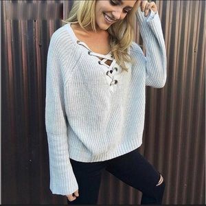 Lace up rib bellflower sleeve sweater